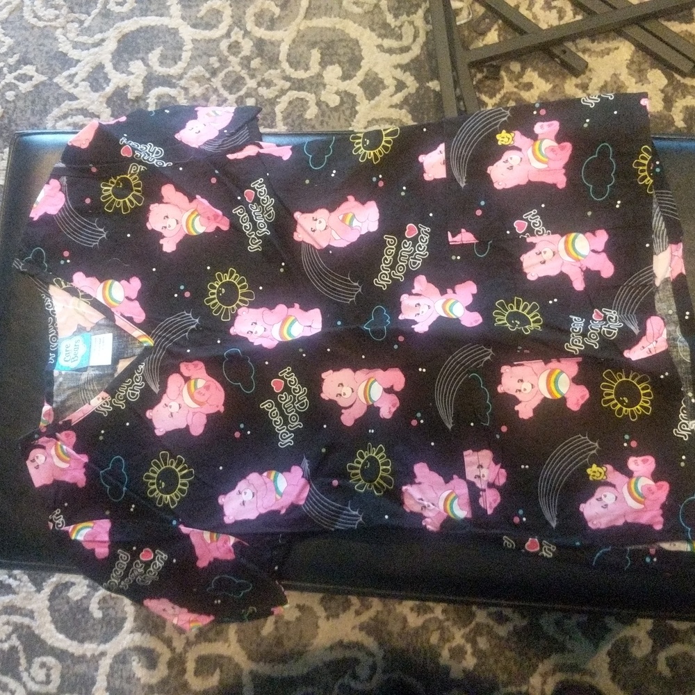 Care Bears size XS scrub top. Has been gently worn.